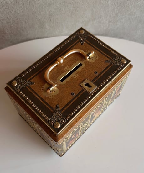 【フランス蚤の市】ヴィンテージブリキ缶の 貯金箱 1970〜1980