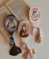 SeverinePineaux  cat handmirror
