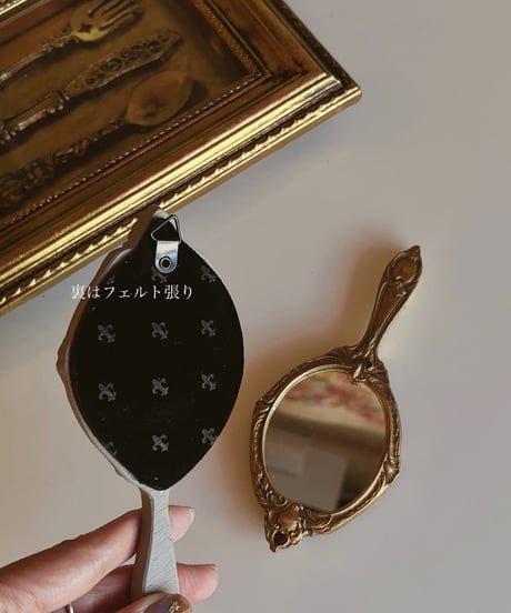 decorative wall hand mirror