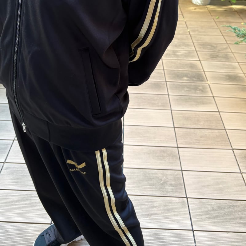 フュージョンロゴトラックパンツ(ブラック×ゴールド) | maruore