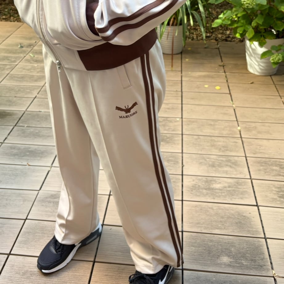 フュージョンロゴトラックパンツ(ベージュ×ブラウン) | maruore-store