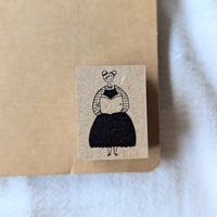 手帳を持つ女の子のラバースタンプ