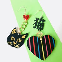 サイケデリックネコピアス