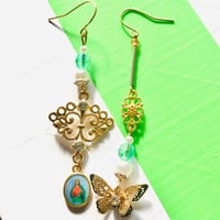 アジアン風マリア様ピアス