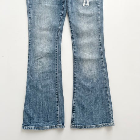 ribbon designed boot cut denim pants