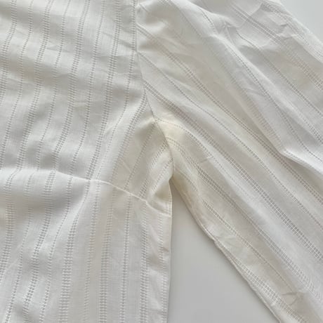 white frill designed shirt
