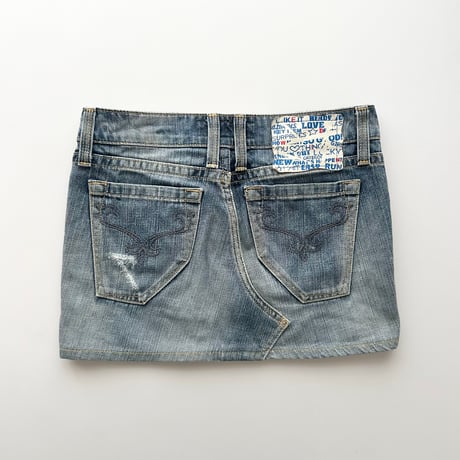 back tag blue denim mini skirt