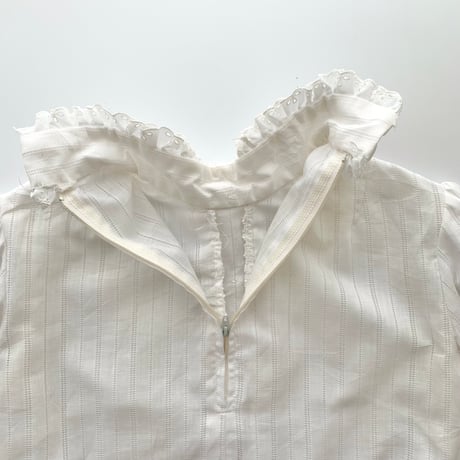 white frill designed shirt