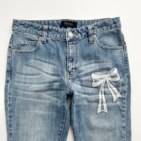 ribbon designed boot cut denim pants