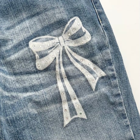 ribbon designed boot cut denim pants