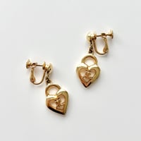 courreges heart logo earrings
