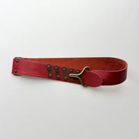 red leather designed belt