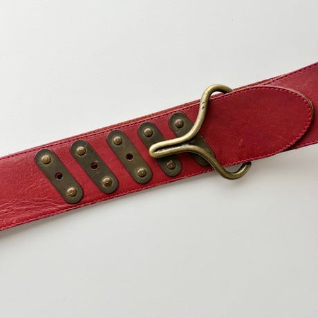 red leather designed belt