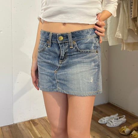back tag blue denim mini skirt