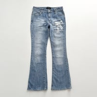 ribbon designed boot cut denim pants