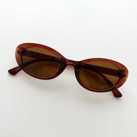 brown oval sunglasses