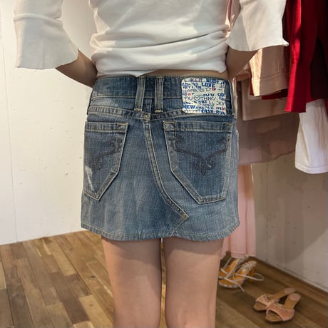 back tag blue denim mini skirt
