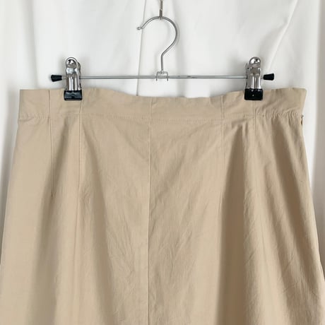 beige back slit long skirt
