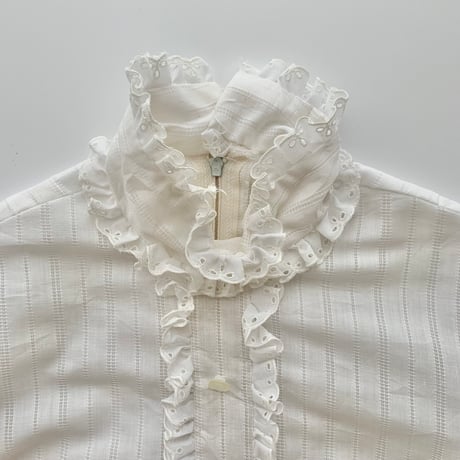 white frill designed shirt