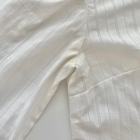 white frill designed shirt