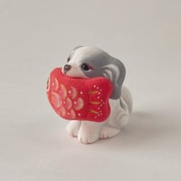 愛でたい犬(大きな魚）