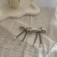 metal ribbon pierce