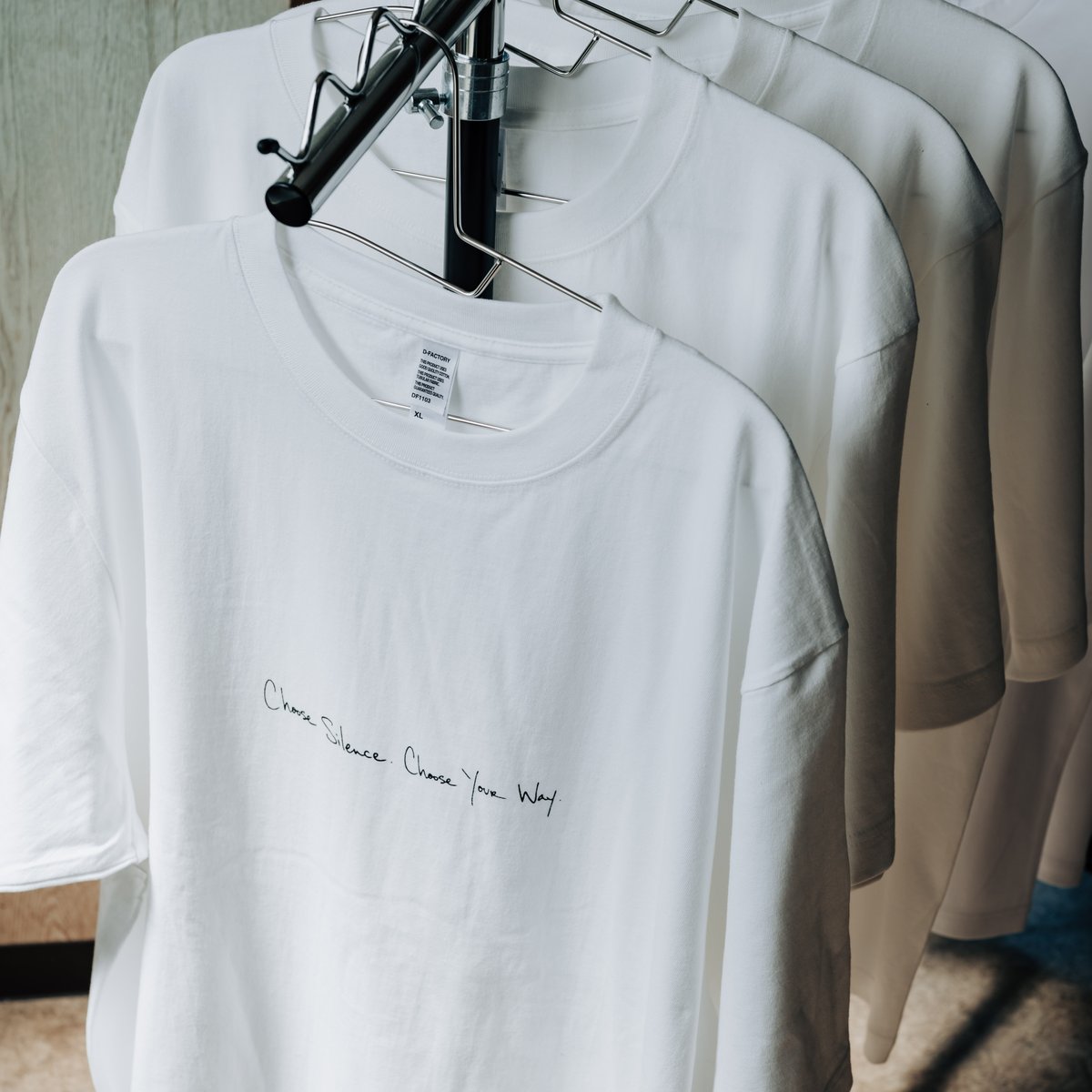 T shirt unlike look Black Unlike Humans Steel T-Shirt