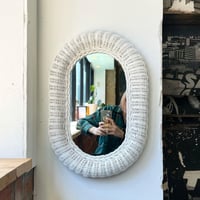 USED RATTAN FLAME WALL MIRROR