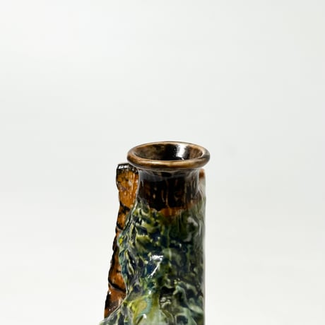 USED CERAMIC BRANDY BOTTLE