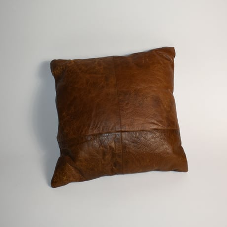 USED LEATHER CUSHION