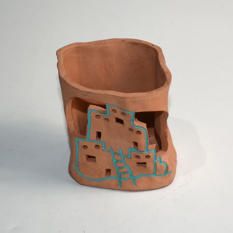 USED HANDMADE CLAY CANDLE HOLDER