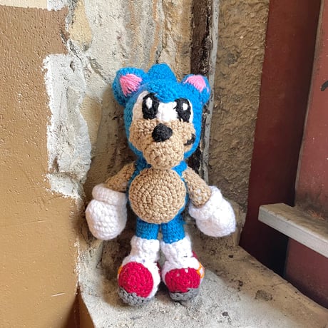 USED KNITTED STUFFED TOY