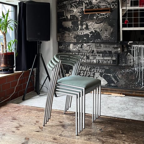 USED POSTMODERN METAL FRAME FABRIC STACKING CHAIR