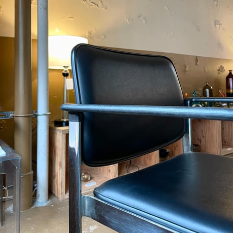 USED METAL LEG VINYL LEATHER STAKING ARM CHAIR