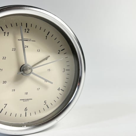 USED ALUMINUM TABLE CLOCK