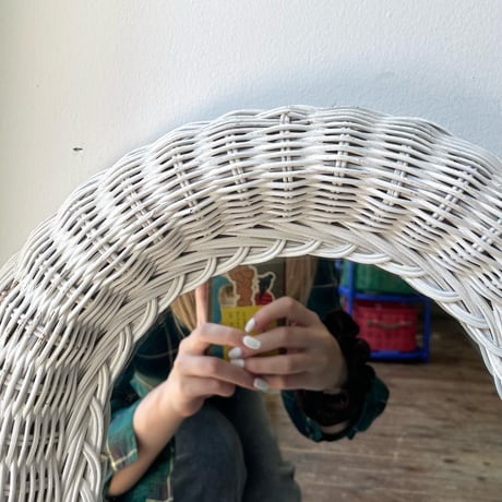 USED RATTAN FLAME WALL MIRROR