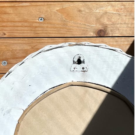 USED RATTAN FLAME WALL MIRROR
