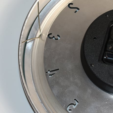 USED ALUMINUM FLAME WALL CLOCK