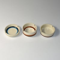 USED CERAMIC ASHTRAY
