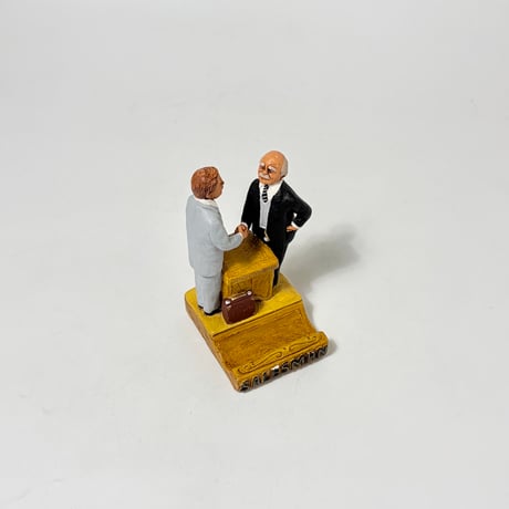 USED  80’S SALESMAN ORNAMENT