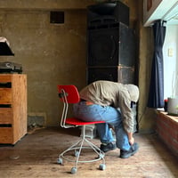 USED POSTMODERN STEEL LEG CARRY CHAIR