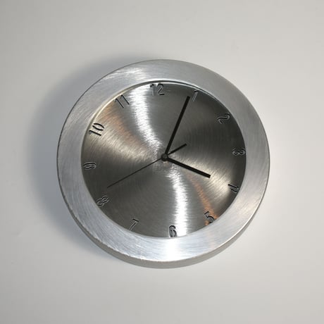 USED ALUMINUM FLAME WALL CLOCK