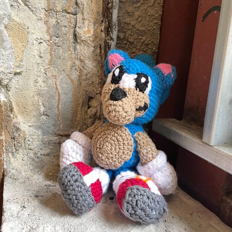 USED KNITTED STUFFED TOY
