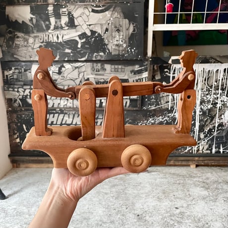 USED WOODEN MOVING TOY