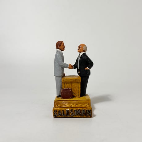 USED  80’S SALESMAN ORNAMENT