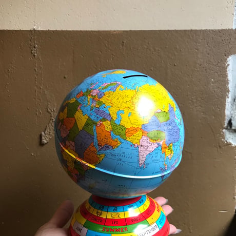 USED 60'S TIN GLOBE PIGGY BANK