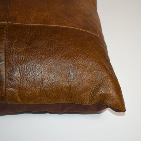 USED LEATHER CUSHION