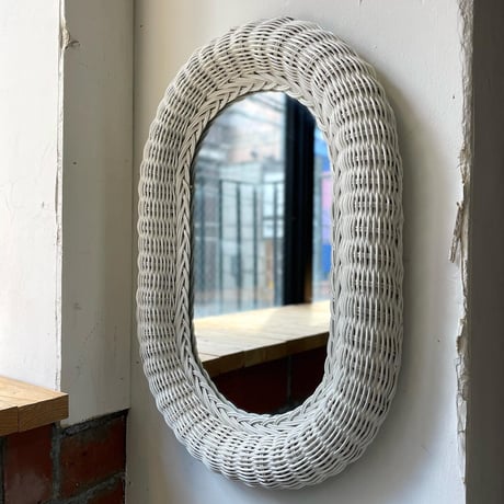 USED RATTAN FLAME WALL MIRROR