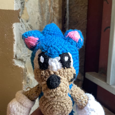 USED KNITTED STUFFED TOY