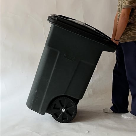 USED “TOTER” 48 GALLON TWO WHEELS TRASH CAN